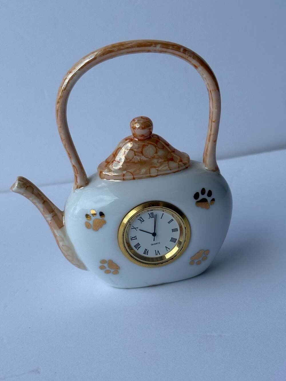 Ceramic Teapot Shaped Quartz Decorative Clock with Paw Print Accents